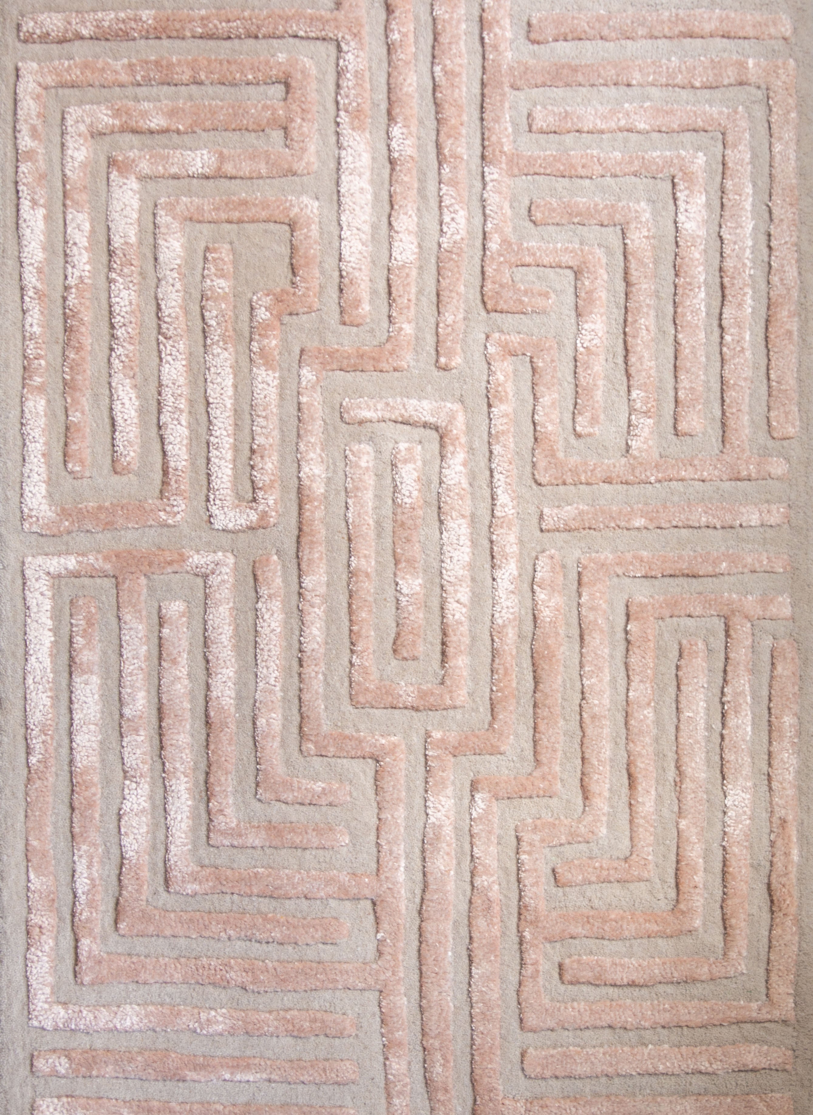 Maze luxury floor rug with a wheat tan border outlining a beige maze