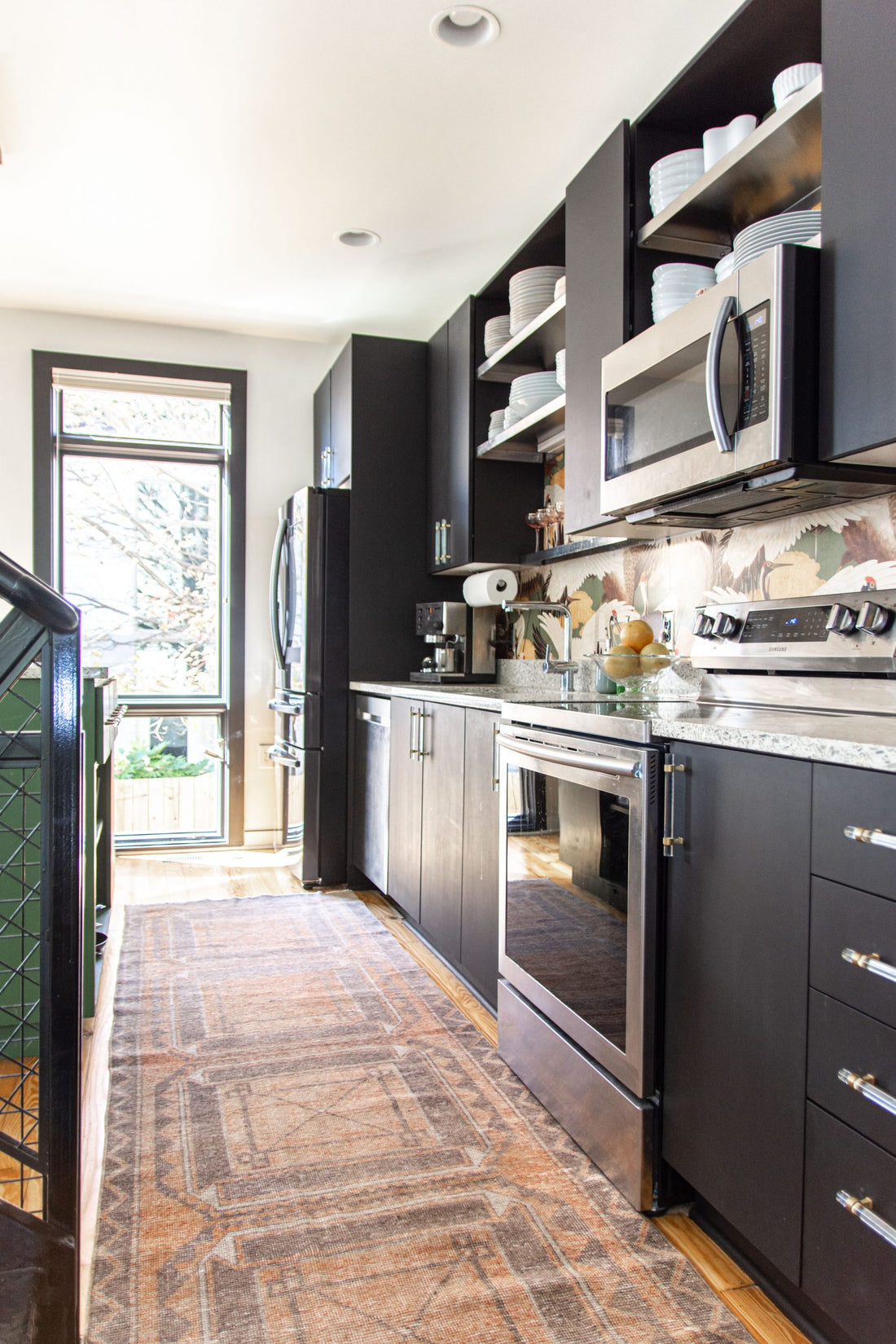 Vintage kitchen runner from Revival Rugs in modern kitchen design on Thou Swell #vintagerug #vintagerunner #kitchenrug #kitchenrunner #vintagekitchenrunner #kitchendesign #kitchendecor #kitchenideas #vintage #revivalrugs