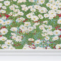 Contrado Chamomile Meadow floral wallpaper with a repeating chamomile flower pattern in soft pastel colors.