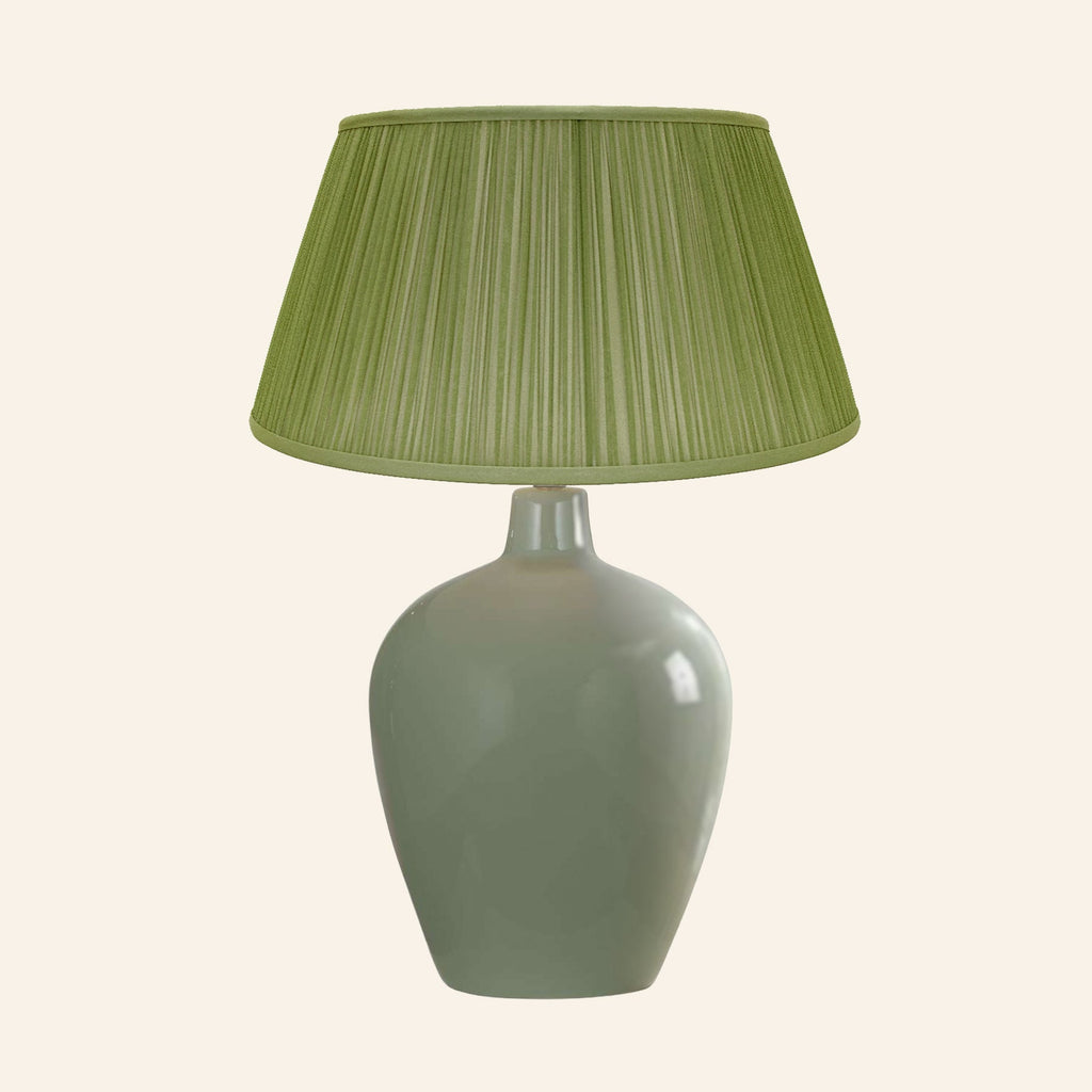 Ansley moss green ceramic table lamp with a Park Green silk pleated shade.