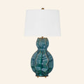 Aurelia deep teal sculptural ceramic table lamp with a standard white hardback shade.