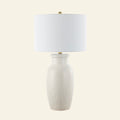 28-inch Camilla textured cream ceramic table lamp by Kevin Francis Design with a rounded base and fabric shade.