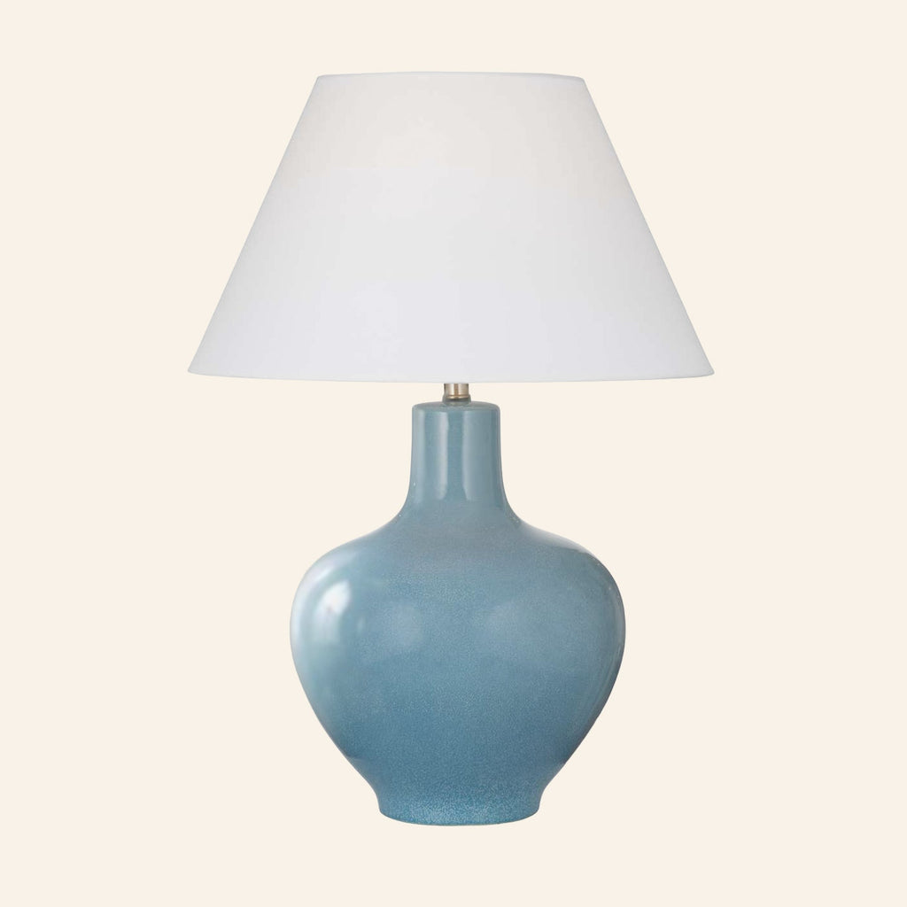 Celeste aqua blue glazed ceramic table lamp with a standard white hardback shade.