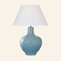 Celeste aqua blue glazed ceramic table lamp with a standard white hardback shade.