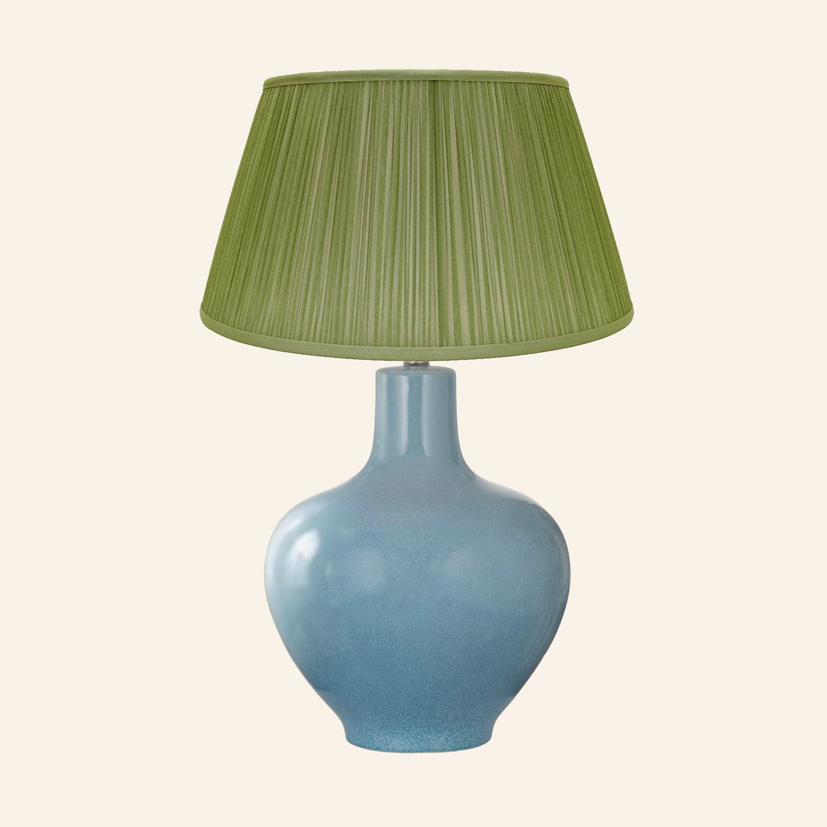 Celeste aqua blue glazed ceramic table lamp with a Park Green silk pleated shade.