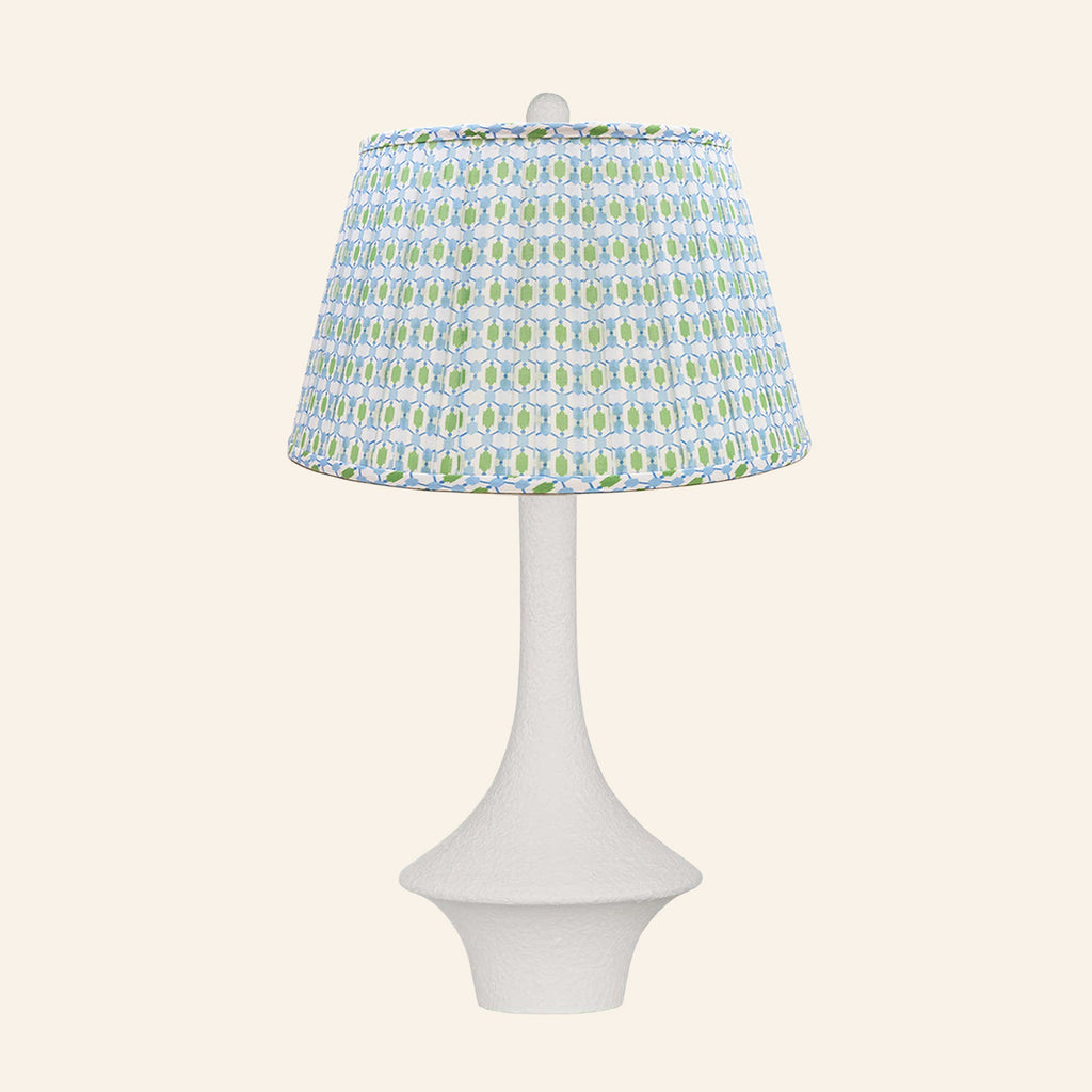 Constance matte white flared table lamp with an Ashford blue and green print pleated shade.