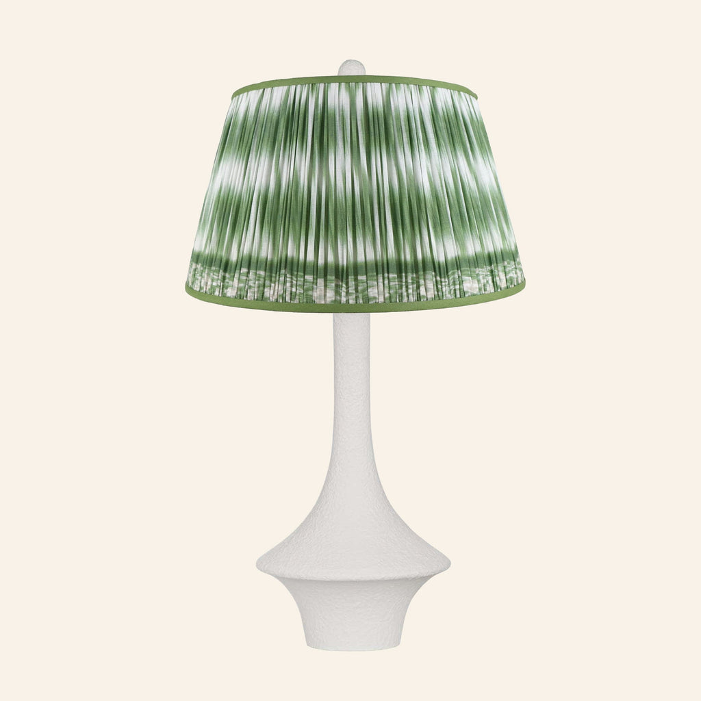 Constance matte white flared table lamp with a Coventry Green ikat pleated shade.