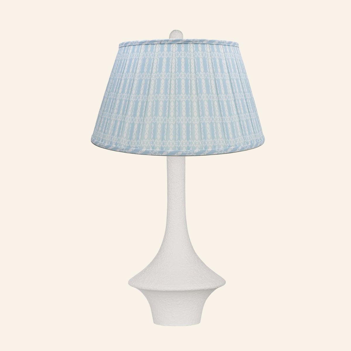 Constance matte white flared table lamp with an Eastwood Blue print pleated shade.
