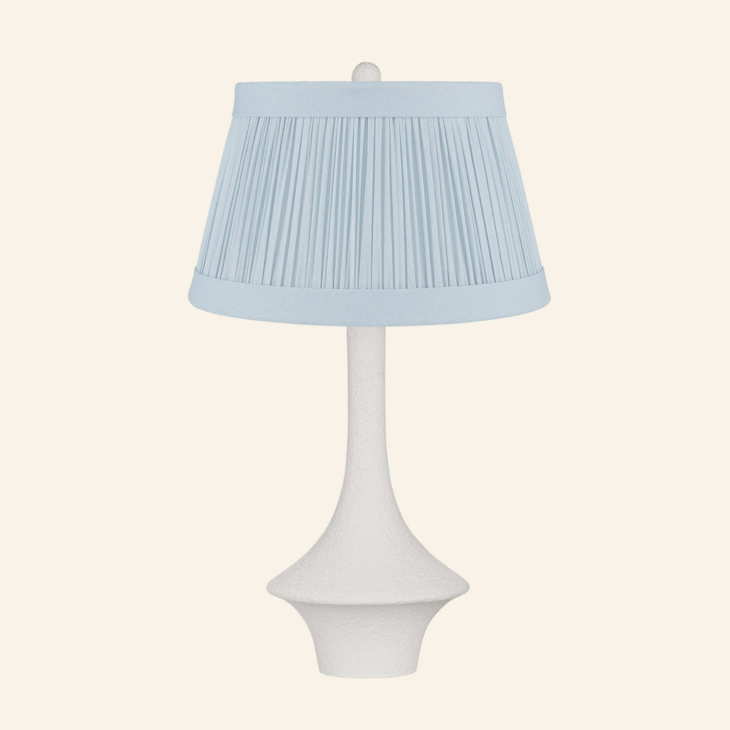 Constance matte white flared table lamp with a Hill Blue linen pleated shade.