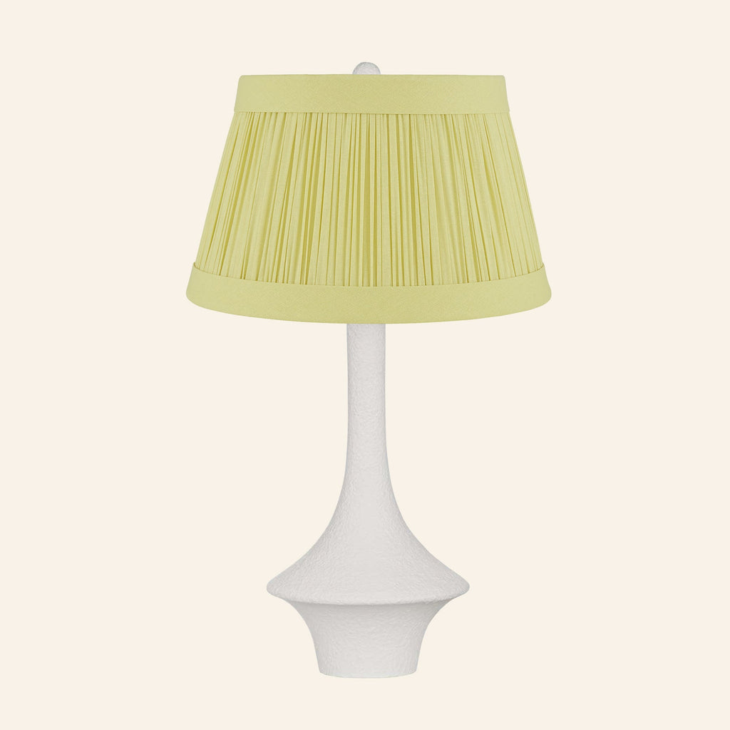 Constance matte white flared table lamp with a Hill Citron linen pleated shade.