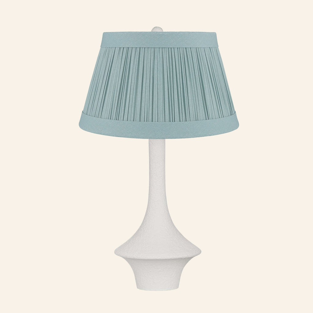 Constance matte white flared table lamp with a Hill Teal linen pleated shade.