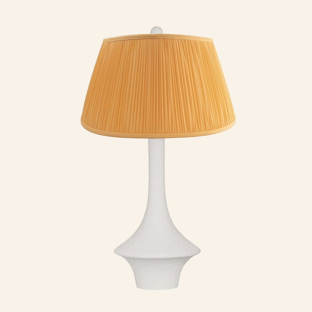 Constance matte white flared table lamp with a Park Orange silk pleated shade.