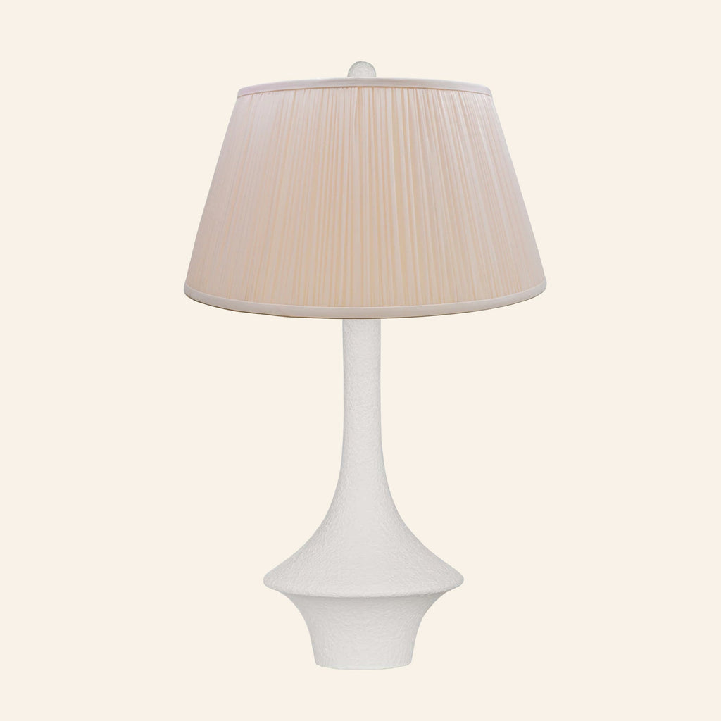 Constance matte white flared table lamp with a Park Peach silk pleated shade.