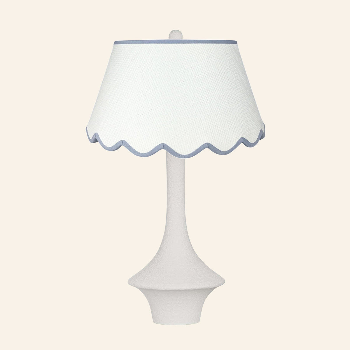 Constance matte white flared table lamp with a Pemberton Blue scalloped shade.