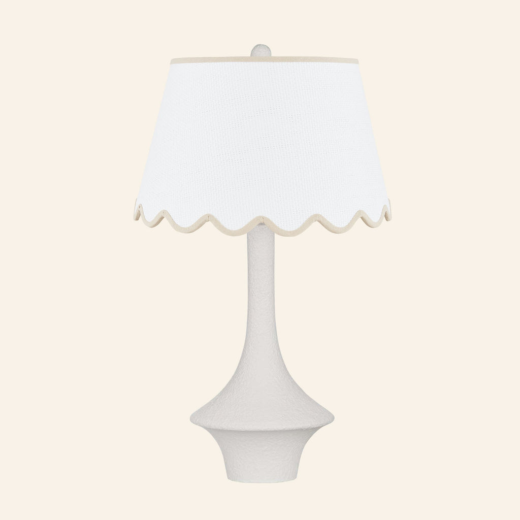 Constance matte white flared table lamp with a Pemberton Tan scalloped shade.