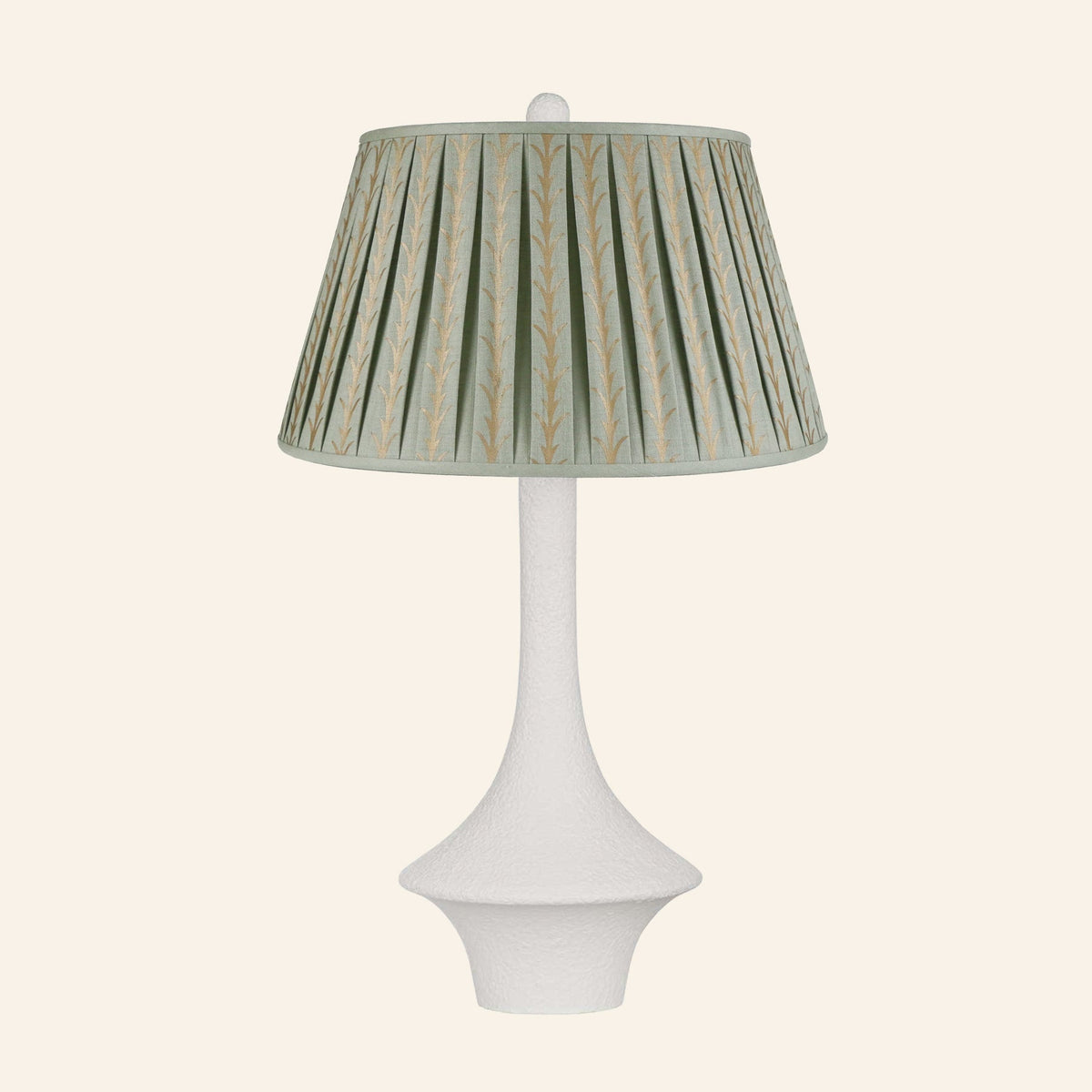Constance matte white flared table lamp with a Rosemary green and gold print pleated shade.