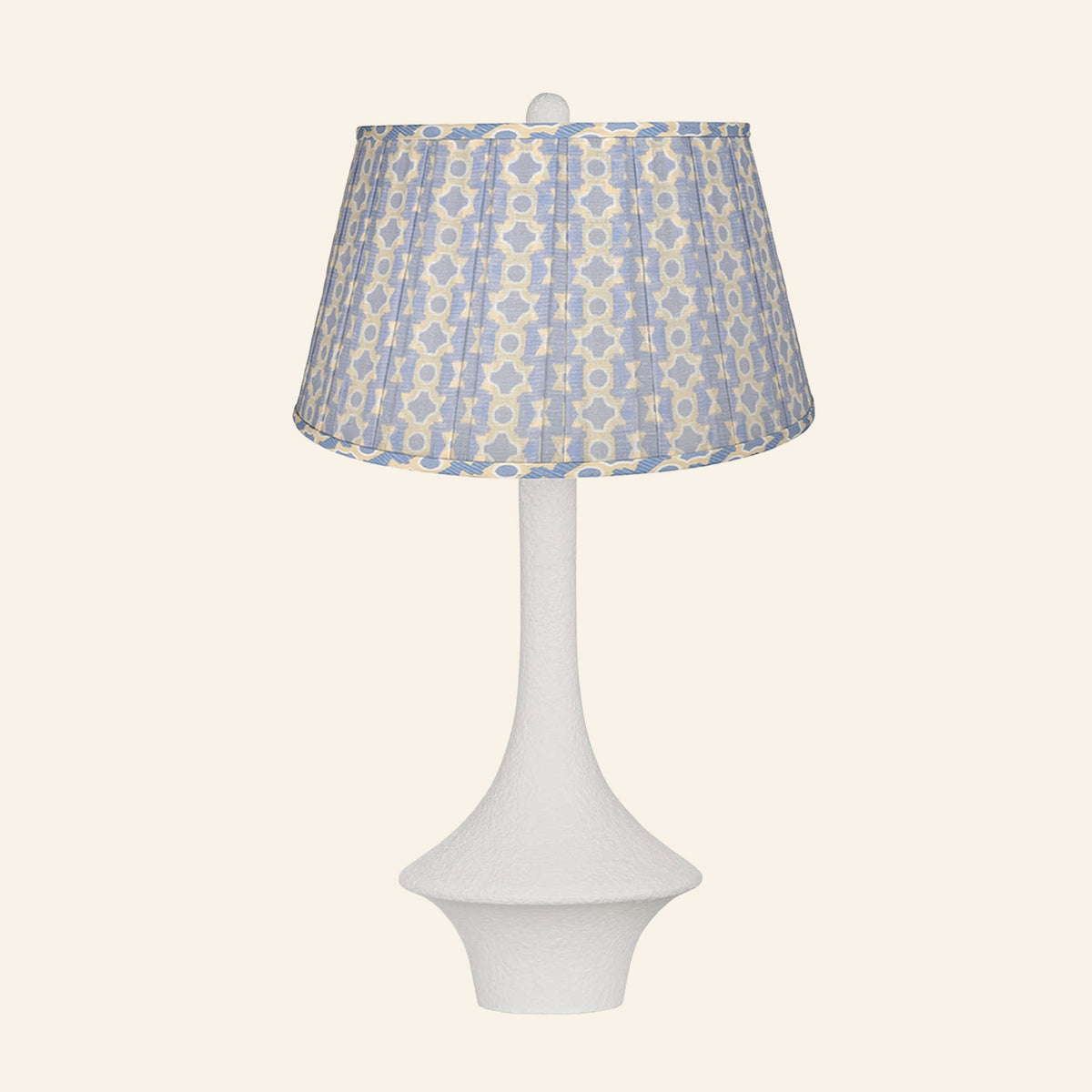 Constance matte white flared table lamp with a Willowbrook blue and tan print pleated shade.