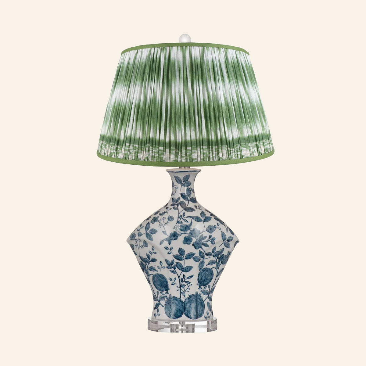 Georgiana blue and white chinoiserie ceramic table lamp with a Coventry Green ikat pleated shade.