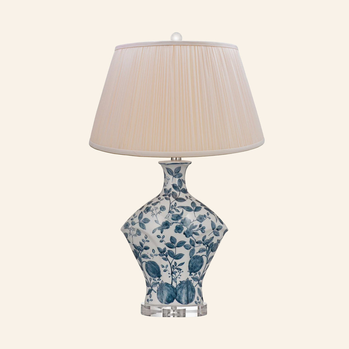 Georgiana blue and white chinoiserie ceramic table lamp with a Park Peach silk pleated shade.