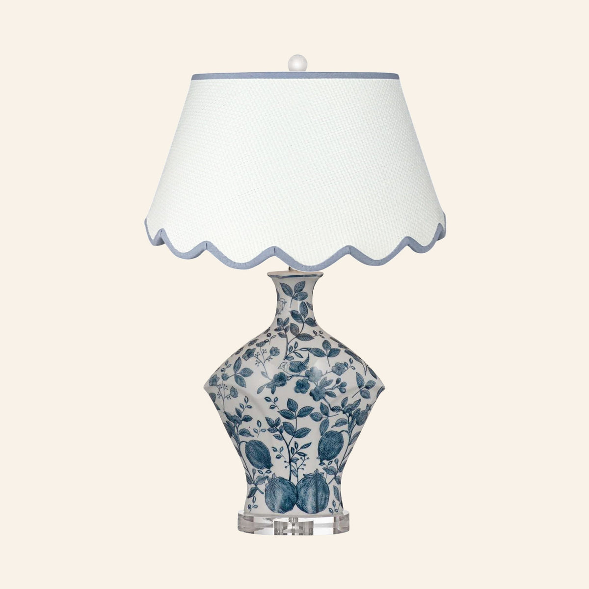 Georgiana blue and white chinoiserie ceramic table lamp with a Pemberton Blue scalloped shade.