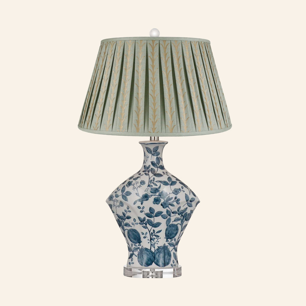 Georgiana blue and white chinoiserie ceramic table lamp with a Rosemary green and gold print pleated shade.