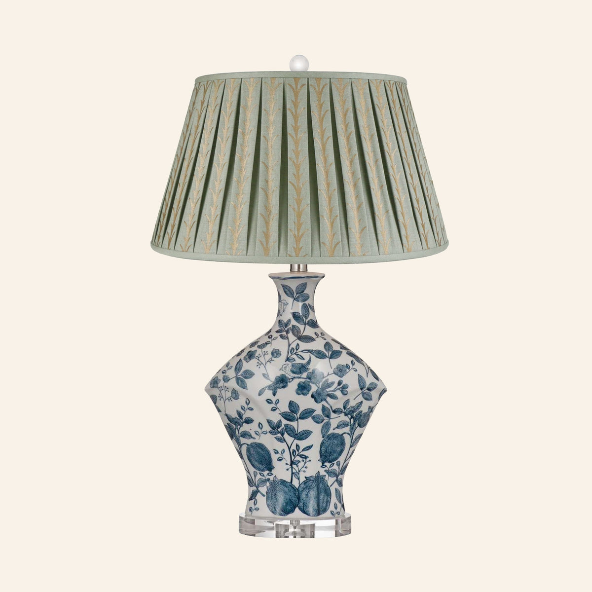 Georgiana blue and white chinoiserie ceramic table lamp with a Rosemary green and gold print pleated shade.