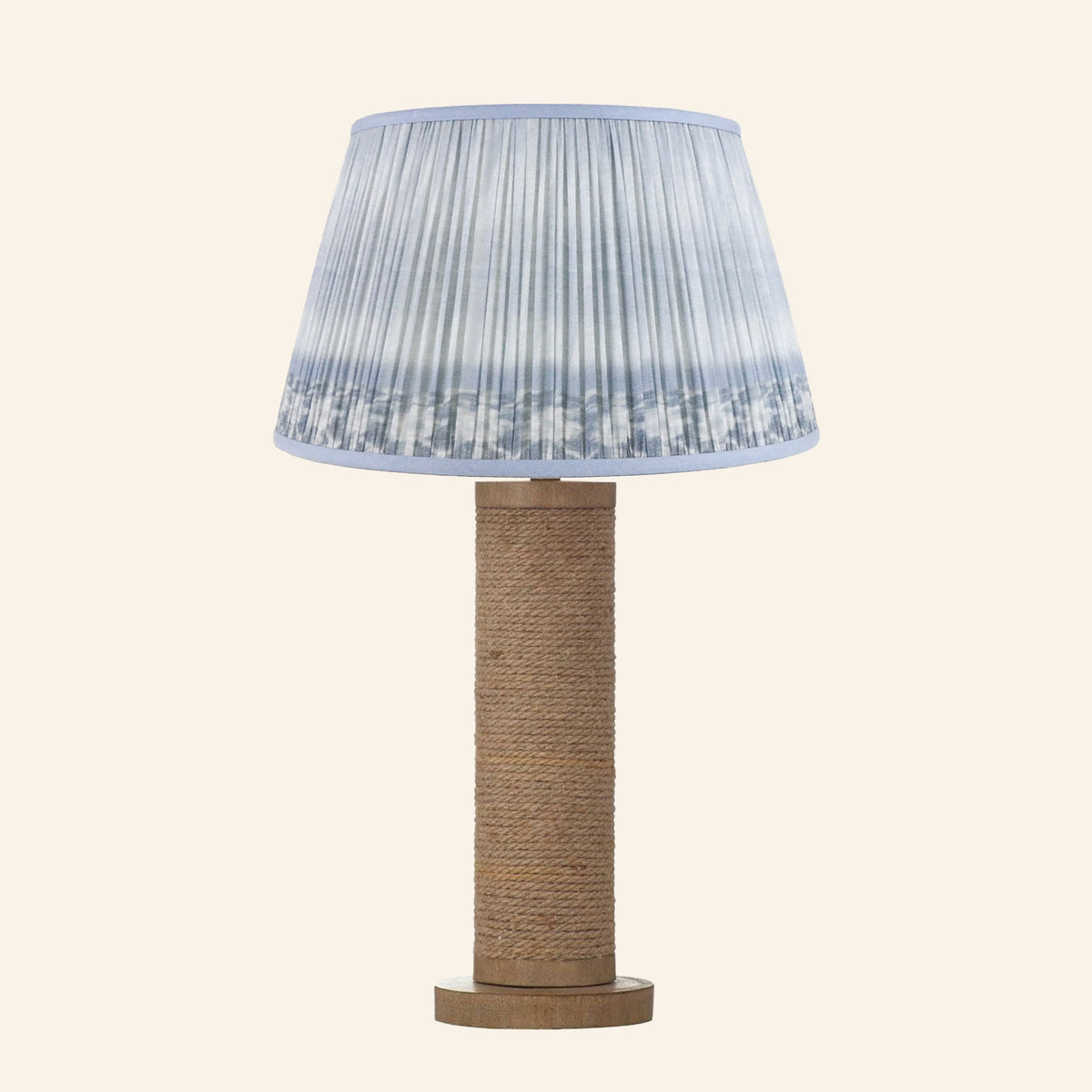 Harriet natural rope wrapped column table lamp with a Coventry Blue ikat pleated shade.