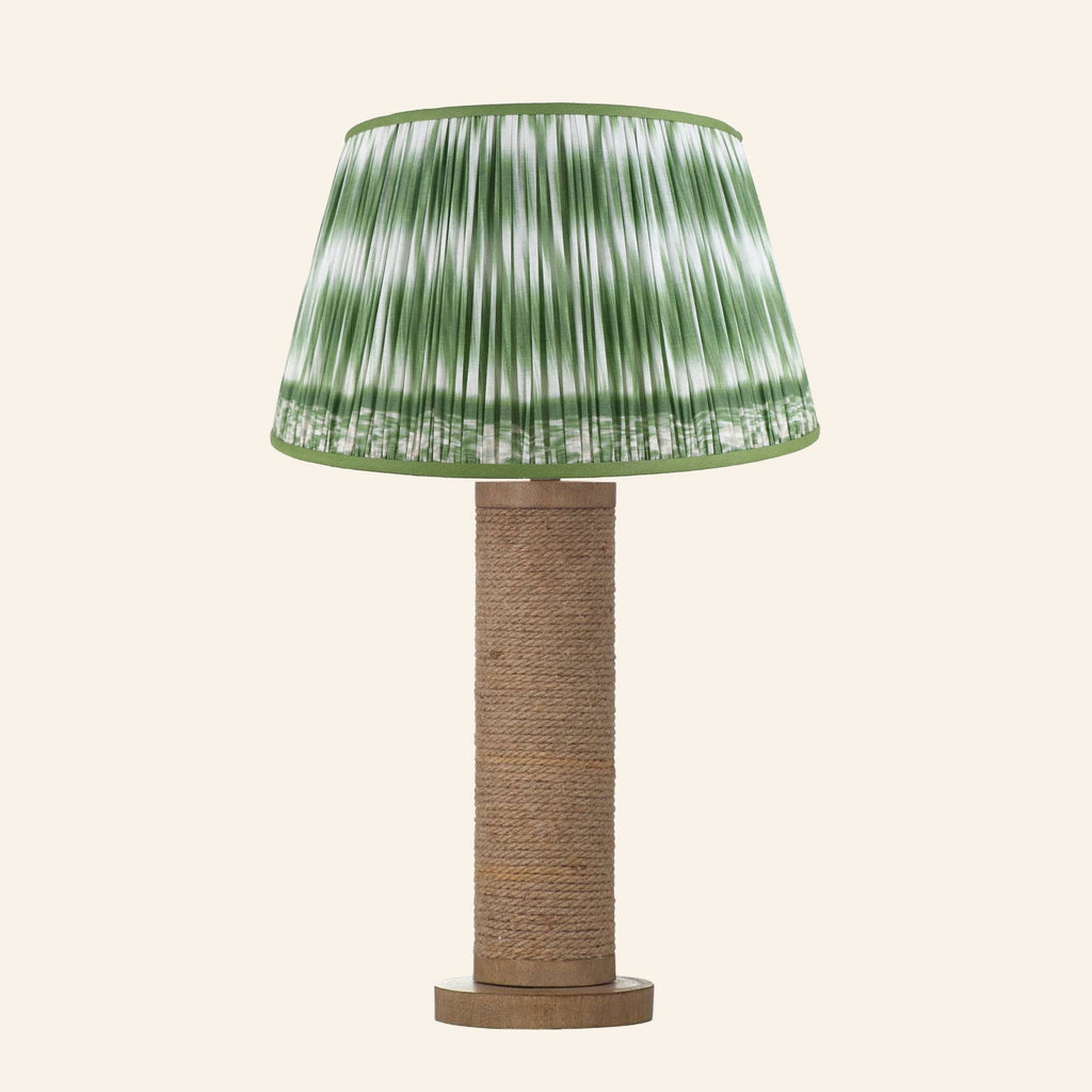 Harriet natural rope wrapped column table lamp with a Coventry Green ikat pleated shade.
