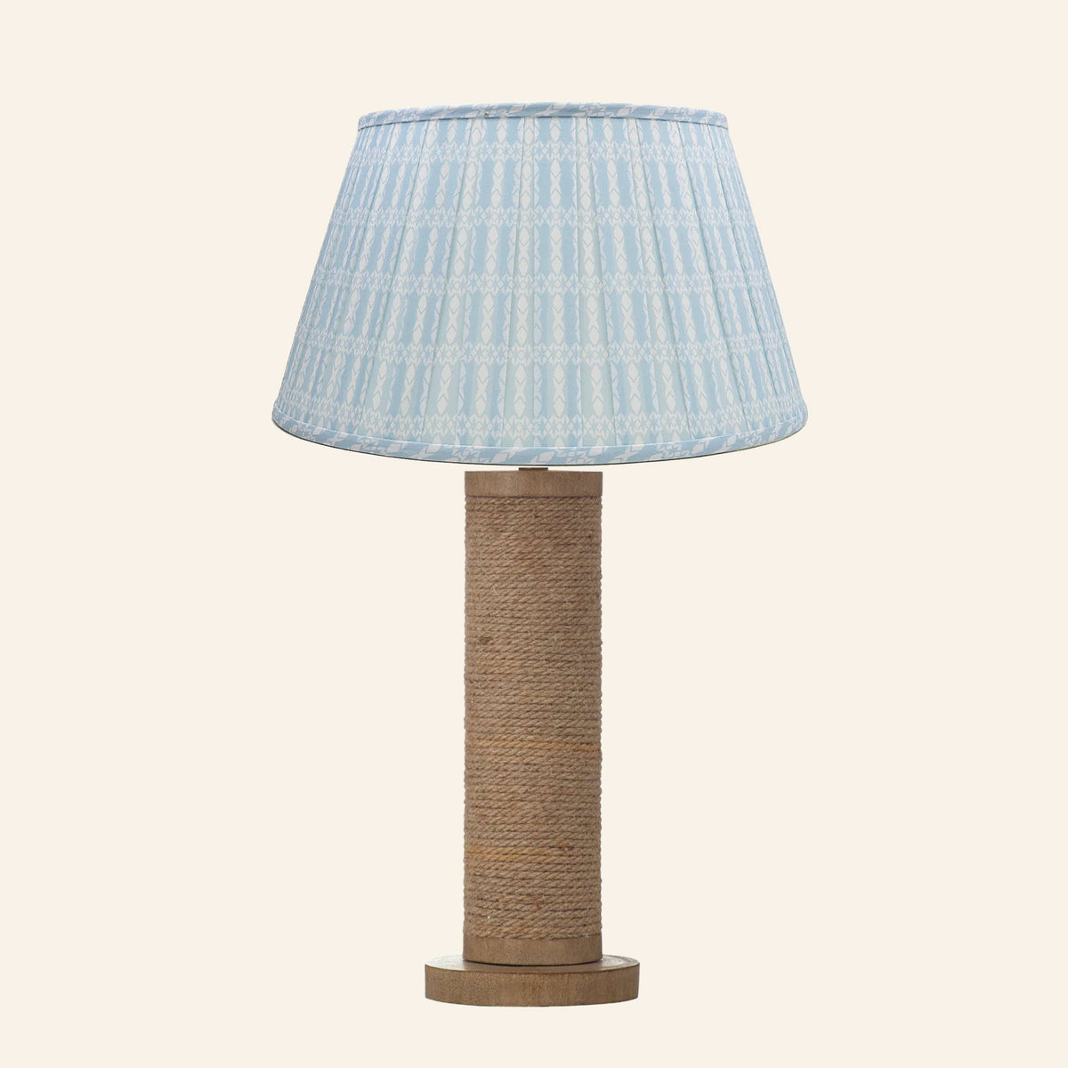 Harriet natural rope wrapped column table lamp with an Eastwood Blue print pleated shade.