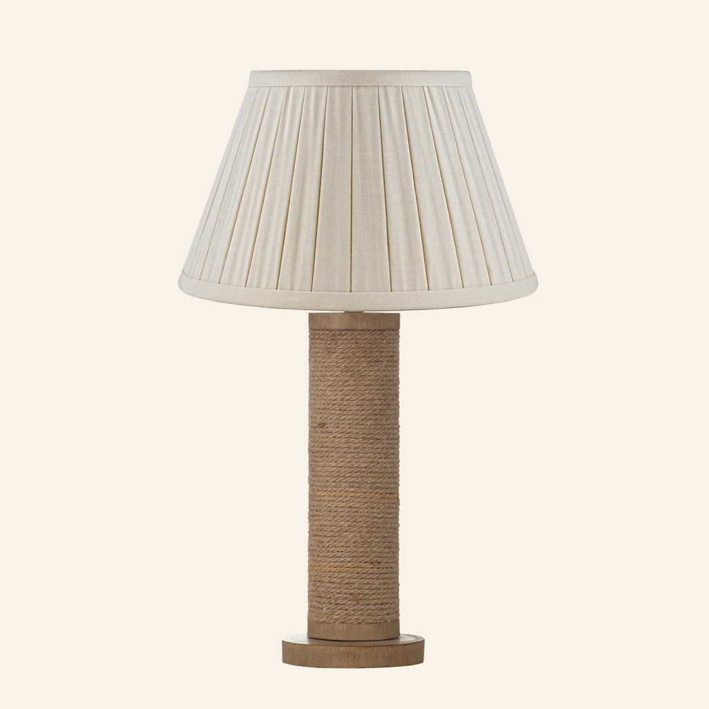 Harriet natural rope wrapped column table lamp with a Heath Cream linen box pleat shade.