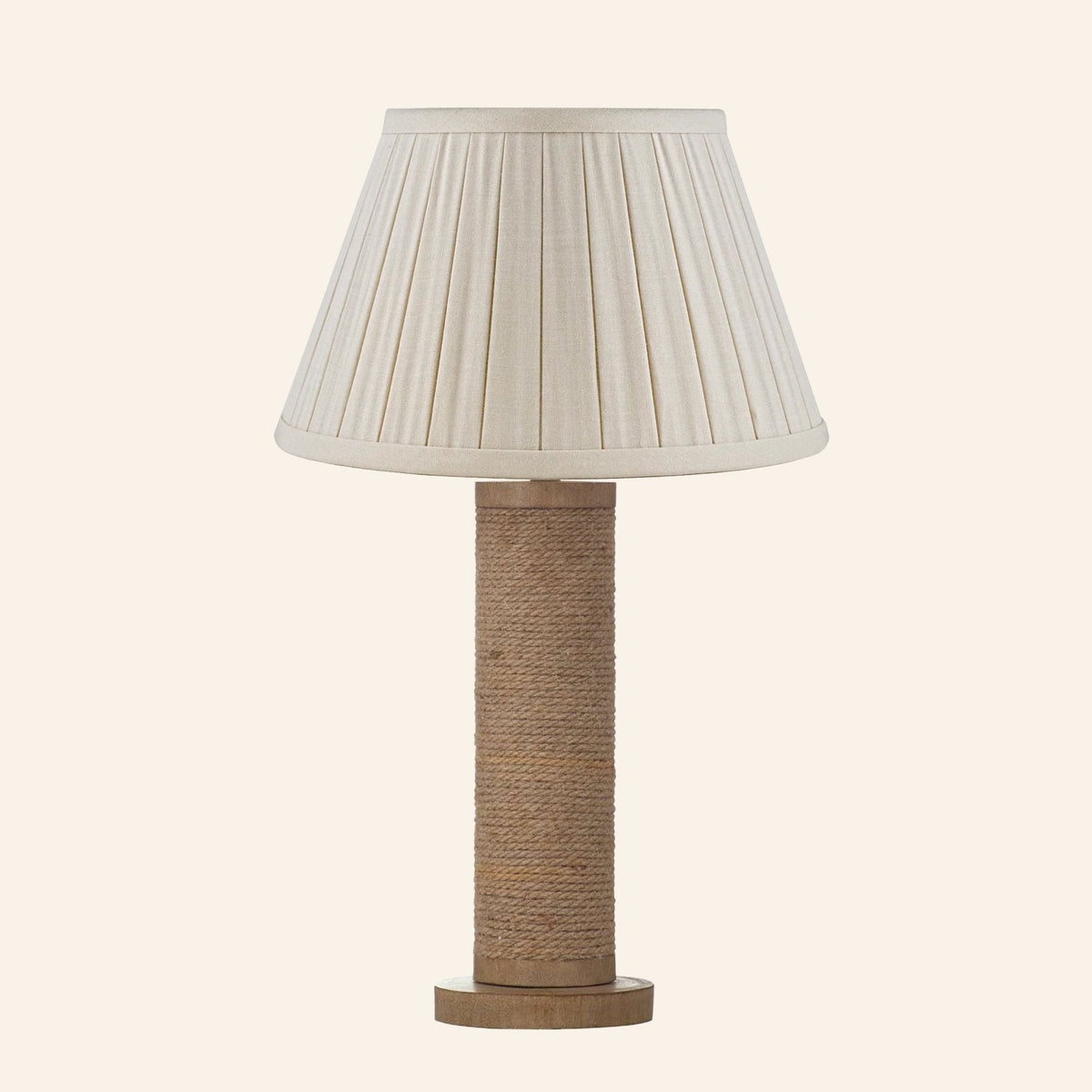 Harriet natural rope wrapped column table lamp with a Heath Cream linen box pleat shade.
