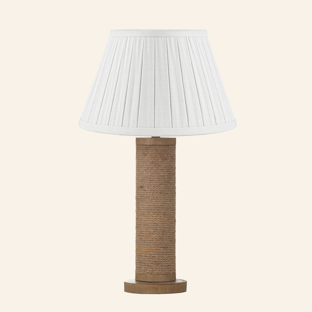 Harriet natural rope wrapped column table lamp with a Heath White linen box pleat shade.