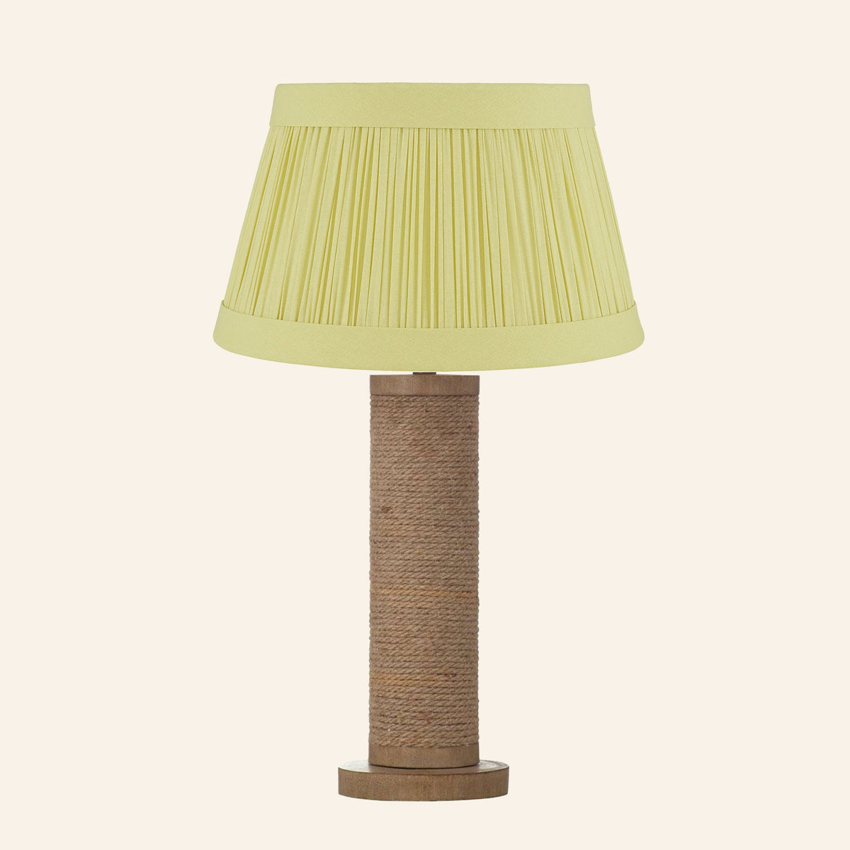 Harriet natural rope wrapped column table lamp with a Hill Citron linen pleated shade.