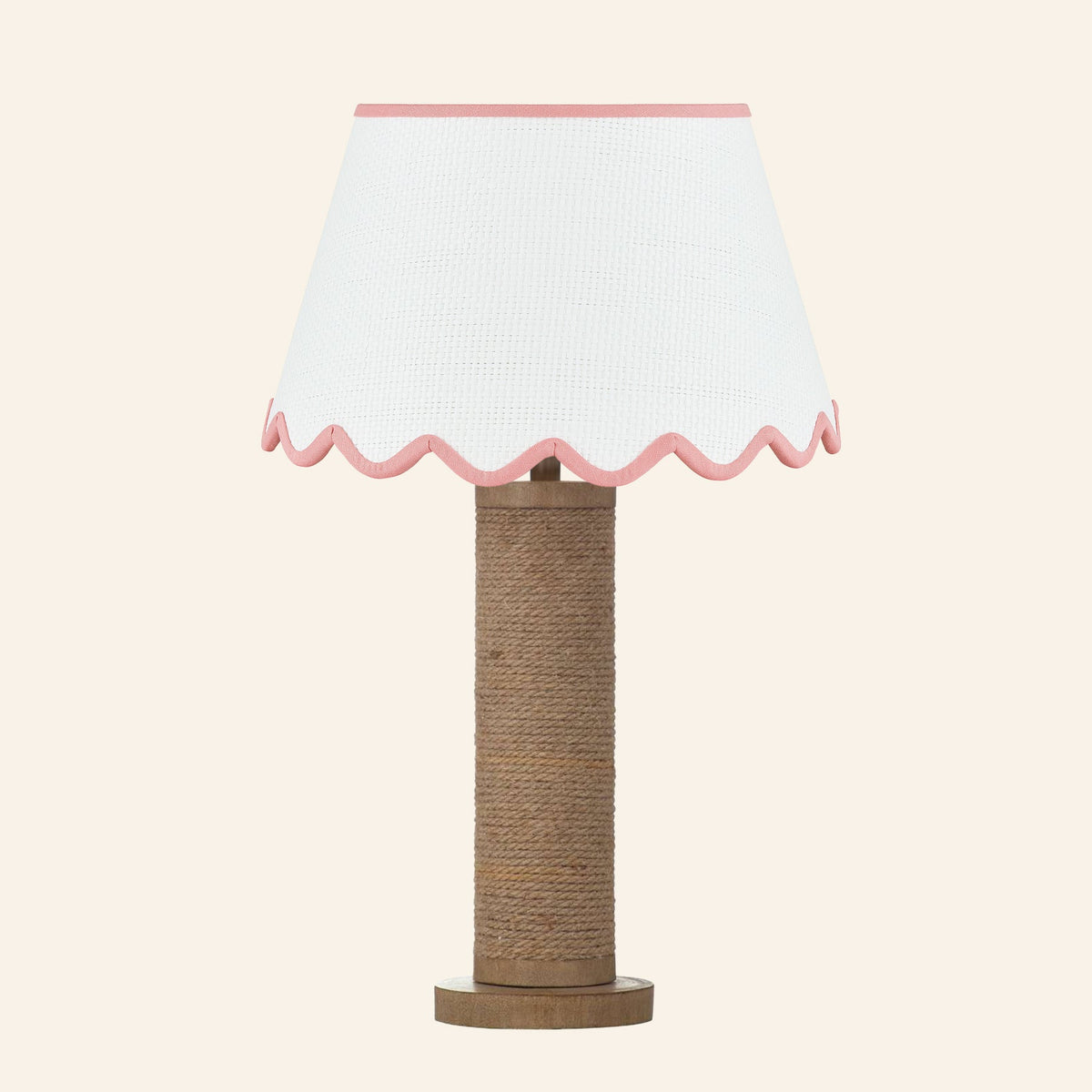 Harriet natural rope wrapped column table lamp with a Pemberton Pink scalloped shade.