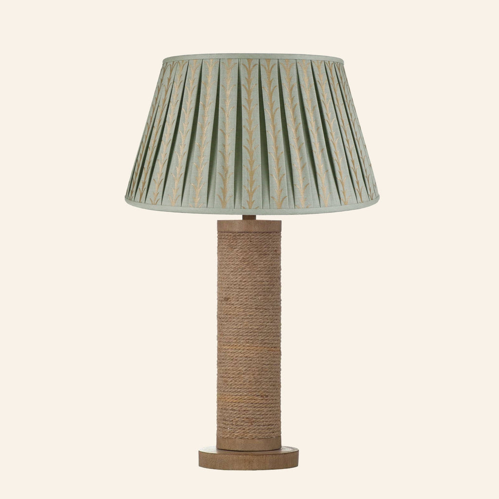 Harriet natural rope wrapped column table lamp with a Rosemary green and gold print pleated shade.