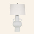 Lavinia matte white textured ceramic urn table lamp with a standard white hardback shade.