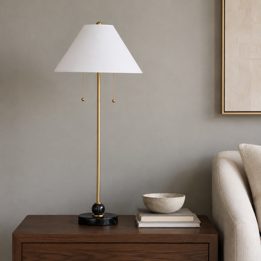 Detail of the Octavia black marble column and brass pull chains