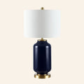 26-inch navy blue table lamp by Kevin Francis Design with a classic, elegant design and a fabric shade.