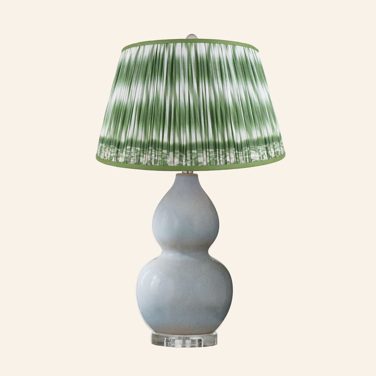 Vivienne gray blue double gourd ceramic table lamp with a Coventry Green ikat pleated shade.