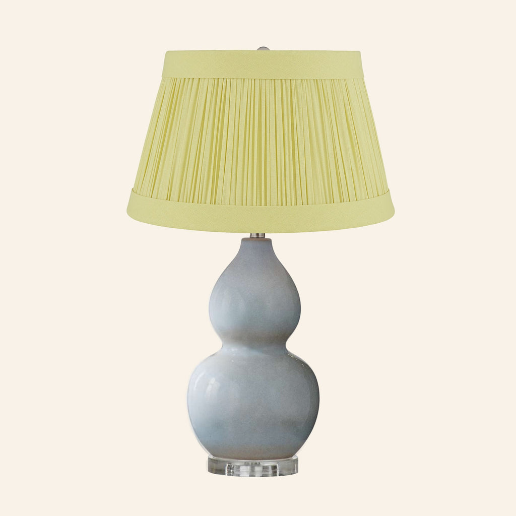 Vivienne gray blue double gourd ceramic table lamp with a Hill Citron linen pleated shade.
