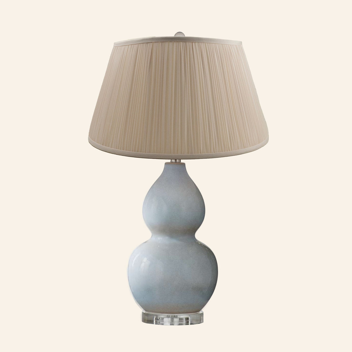 Vivienne gray blue double gourd ceramic table lamp with a Park Taupe silk pleated shade.