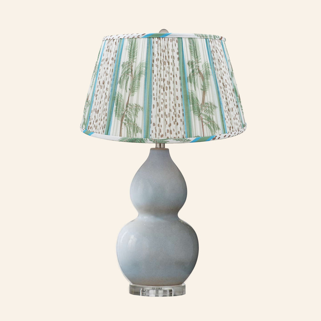 Vivienne gray blue double gourd ceramic table lamp with a Pinehurst blue and green print pleated shade.