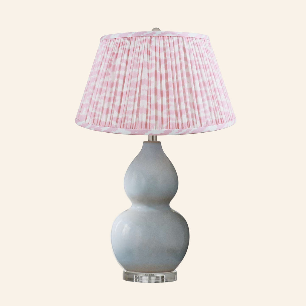 Vivienne gray blue double gourd ceramic table lamp with a Rosewood Pink print pleated shade.