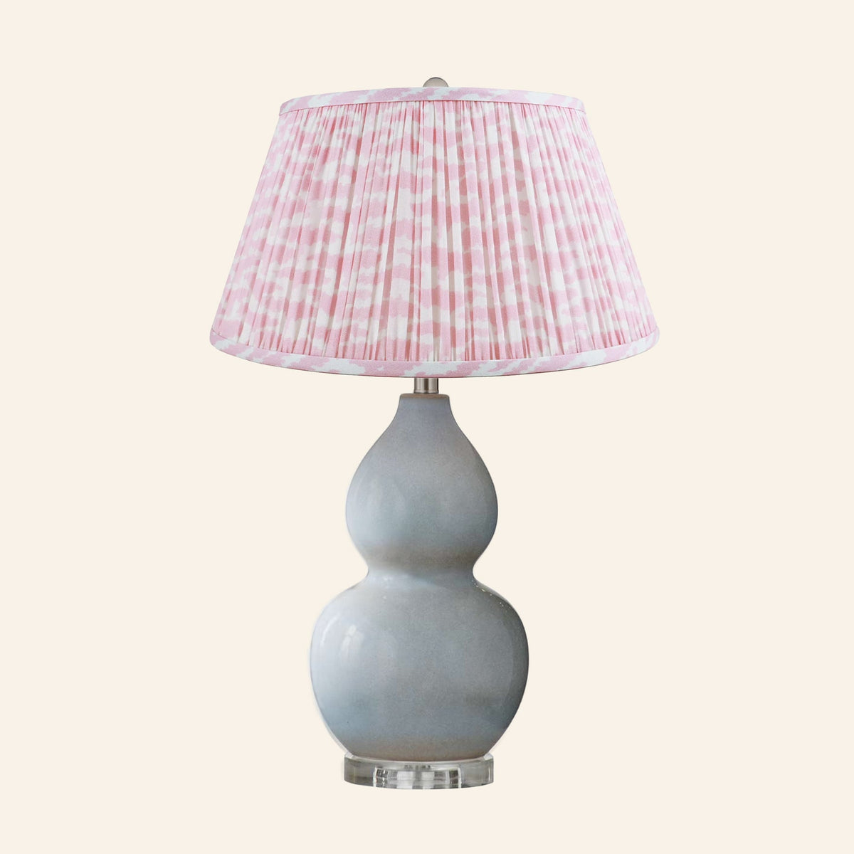 Vivienne gray blue double gourd ceramic table lamp with a Rosewood Pink print pleated shade.
