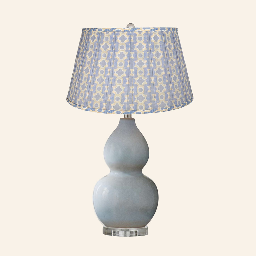 Vivienne gray blue double gourd ceramic table lamp with a Willowbrook blue and tan print pleated shade.