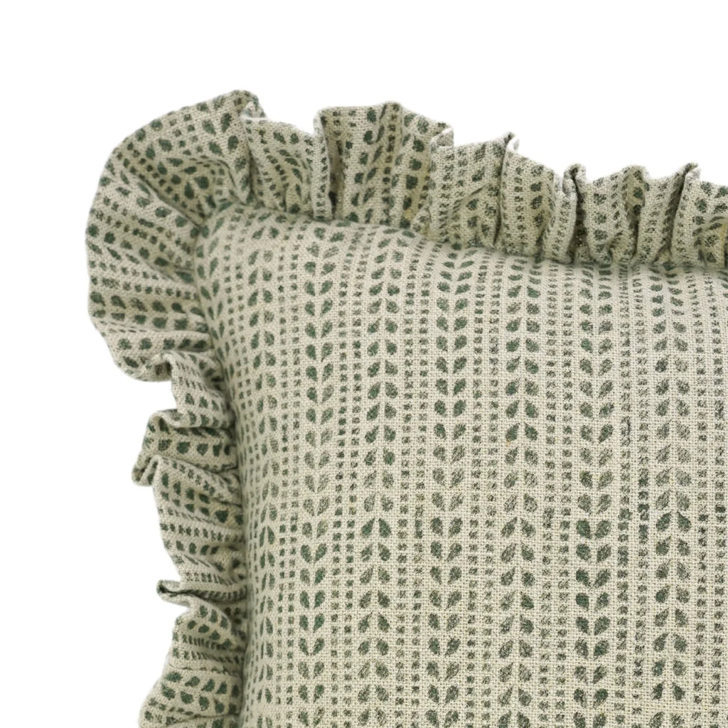 Hand block printed leaf sprig pattern on the Barksdale heavyweight linen ruffled pillow cover