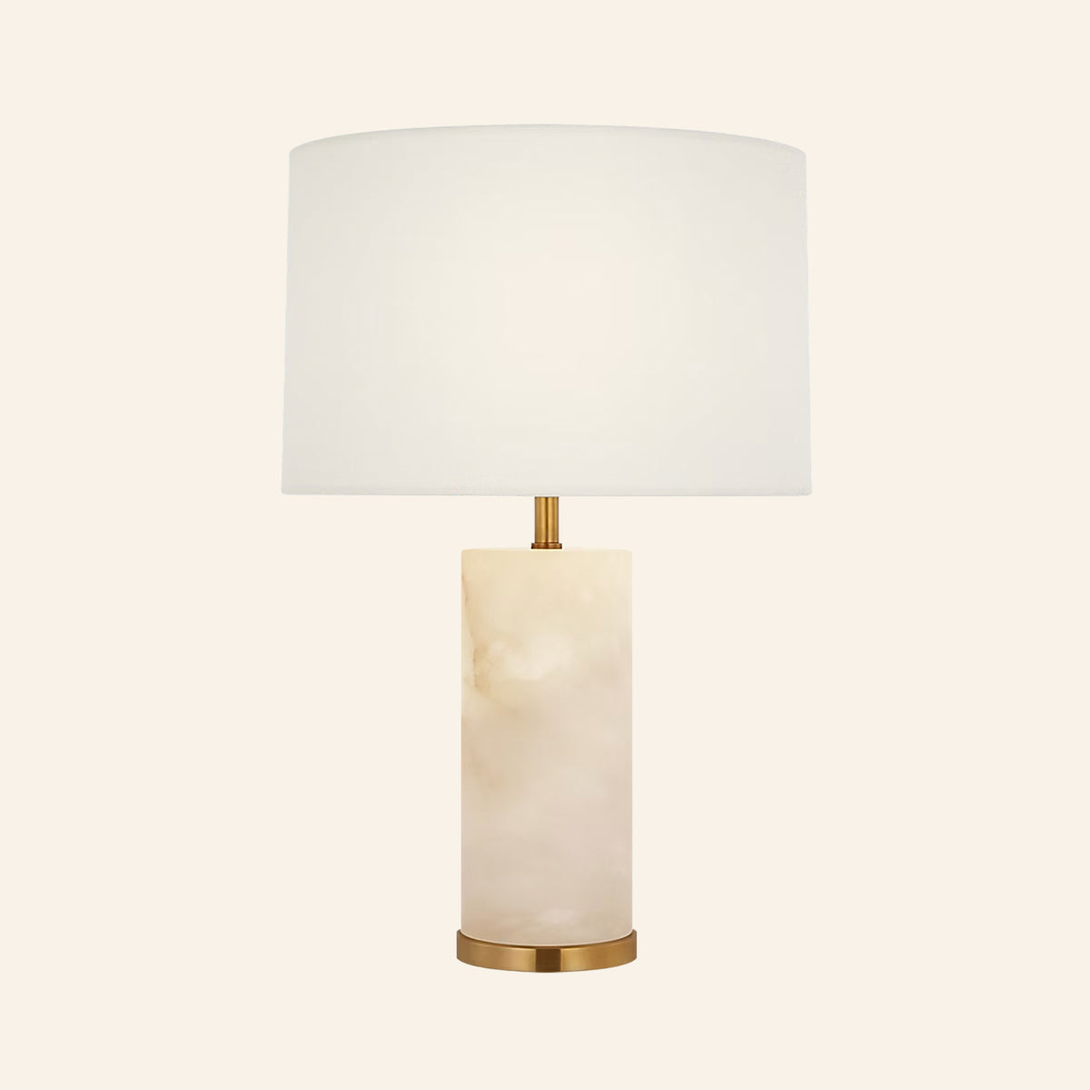 16-inch Hayes cordless table lamp with a natural alabaster column base on a brass foot and a white linen drum shade, by Kevin Francis Design