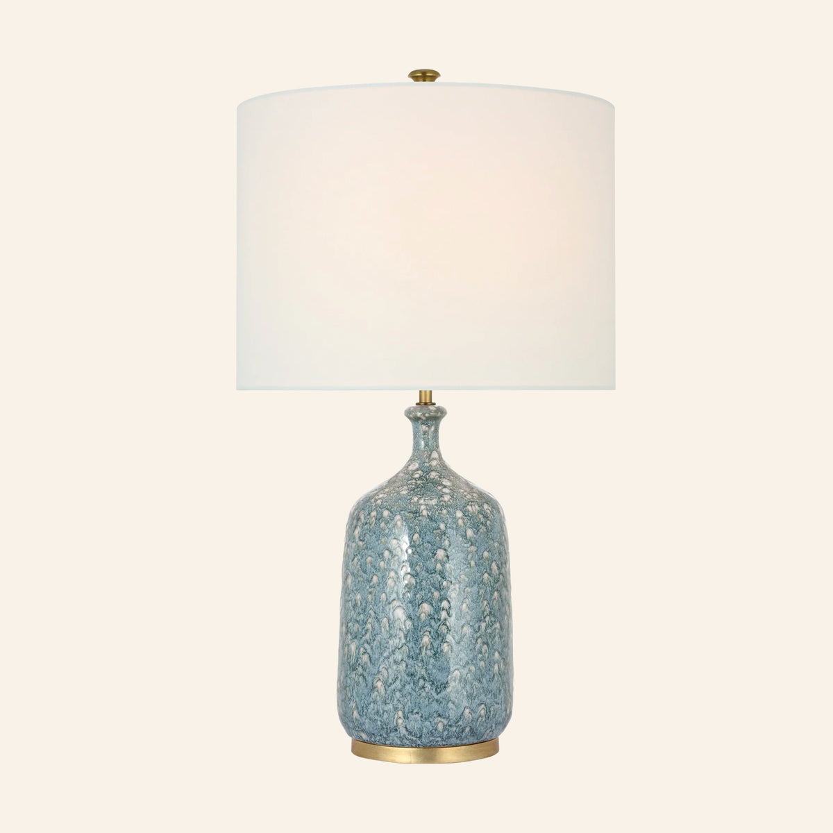 25-inch Imogen cordless table lamp with a speckled blue glazed ceramic bottle base, brass foot and white linen drum shade, by Kevin Francis Design
