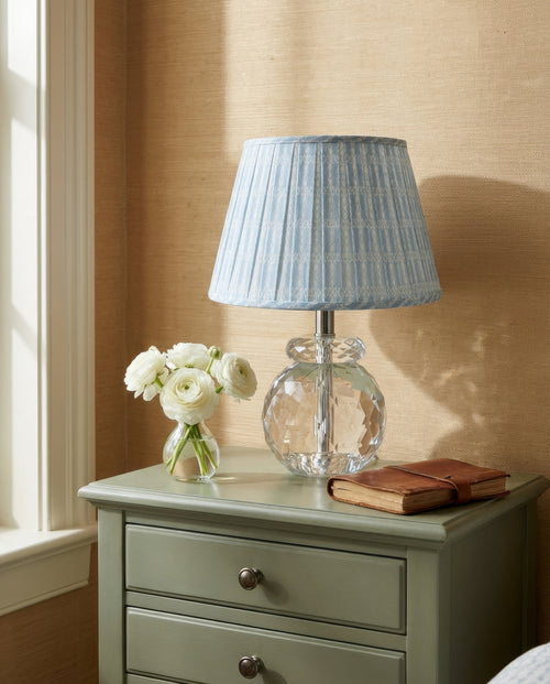 12-inch Daphne faceted crystal mini table lamp by Kevin Francis Design on sage green nightstand in interior design vignette