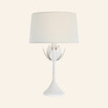 17-inch Julian cordless table lamp in plaster white, a slender stem opening into a crown of leaves under a white linen shade, by Kevin Francis Design